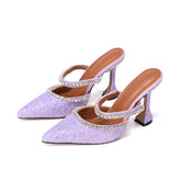 Lilafarbene Pumps aus Leder mit Pailletten und Kristallen